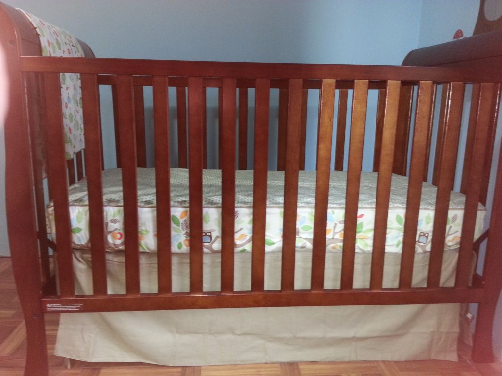 the optimal height for crib mattress